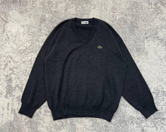 Maglione vintage Lacoste in lana, nel classico colore grigio scuro.
