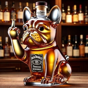 May include: A novelty Jack Daniel's Tennessee Whiskey bottle shaped like a golden bulldog, with the dog's arm raised in a gesture. The bottle has a cork stopper and a label with the brand's logo. The background shows a shelf of liquor bottles.