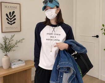 T-shirt grafica a maniche raglan, top casual a maniche lunghe, versatile, streetwear.