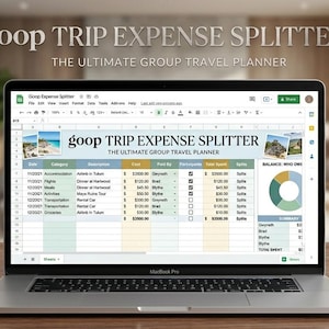 May include: A laptop displays a spreadsheet titled "goop TRIP EXPENSE SPLITTER: THE ULTIMATE GROUP TRAVEL PLANNER." The screen shows expense categories, amounts, and a pie chart. A succulent, lotion, notebook, and mouse are on the desk.