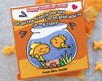 May include: A printable Valentine's Day card featuring a goldfish bowl with two goldfish inside. The card says "Happy Valentine's Day! Of all the fish in the sea I'm so glad you're in my class!" and "From Mrs. Smith".