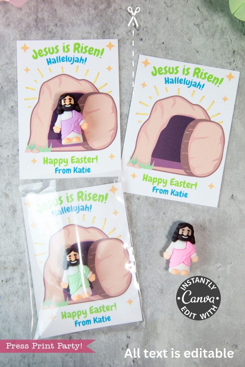 Pode incluir: Cart&otilde;es de P&aacute;scoa com o texto "Jesus ressuscitou! Aleluia!" e "Feliz P&aacute;scoa! De Katie." Os cart&otilde;es apresentam uma ilustra&ccedil;&atilde;o de Jesus saindo de um t&uacute;mulo. Um cart&atilde;o &eacute; embalado com uma pequena figura de Jesus.