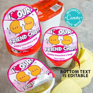 May include: Three small containers of chips with pink and white labels that say "I love our friend-chip!"  Happy Valentine's Day! From Olivia.  The bottom text is editable.  The containers are stacked on top of each other.  There are also some loose chips on the table.