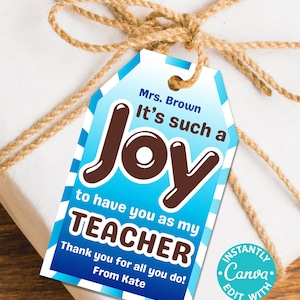 May include: A blue and white striped teacher appreciation gift tag with the text "It's such a Joy to have you as my TEACHER. Thank you for all you do! From Kate." The tag is tied with twine and has a brown "Joy" graphic.