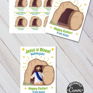 Pode incluir: Cart&otilde;es e autocolantes com o tema da P&aacute;scoa com o texto "Jesus ressuscitou! Aleluia!" e "Feliz P&aacute;scoa! De Katie." Os cart&otilde;es apresentam uma ilustra&ccedil;&atilde;o de Jesus e um t&uacute;mulo vazio.