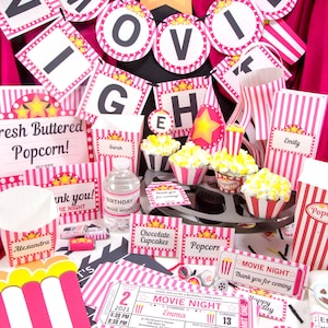 May include: Pink and white striped party decorations for a movie night birthday party. The decorations include a banner that says "Movie Night", popcorn boxes, cupcake wrappers, and a ticket invitation. The invitation says "Movie Night" and features a film reel design.