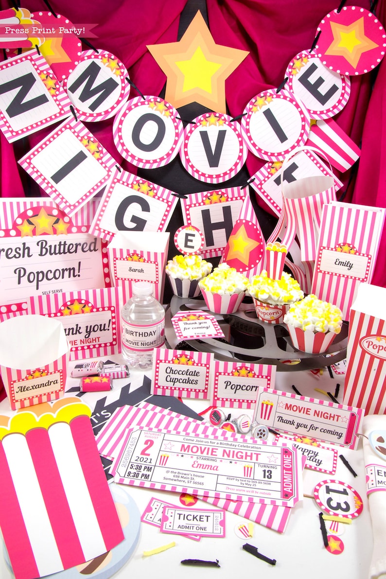 May include: Pink and white striped party decorations for a movie night birthday party. The decorations include a banner that says "Movie Night", popcorn boxes, cupcake wrappers, and a ticket invitation. The invitation says "Movie Night" and features a film reel design.