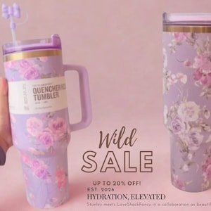 May include: Two lavender tumblers featuring a floral pattern with pink and white roses. The left tumbler has a handle, a straw with a bow topper, and a label reading The Flowstate Quencher H2.0 Tumbler. The text Wild Sale is displayed centrally.