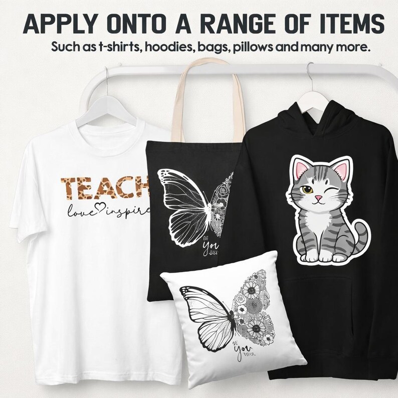 May include: A white t-shirt with "TEACH love inspire" text, a black tote bag and a black hoodie with a cat graphic, and a white pillow with a butterfly design. The image shows examples of items that can be customized.