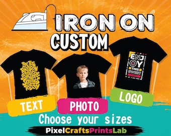 May include: Three black t-shirts displayed on an orange background. The left shirt features yellow text reading Be The Reason That Someone Smiles Today. The center shirt displays a child's photo. The right shirt shows text reading ENJOY THIS SWEET MOMENT. Text labels include TEXT, PHOTO, LOGO, and PixelCraftsPrintsLab.