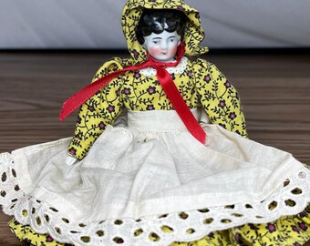 Vintage porseleinen hoofdpop gele bloemenjurk porselein miniatuur 6,5" Victoriaans