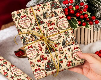 May include: Wrapping paper with a cream background featuring a repeating pattern of Christmas trees, houses, ornaments, and gifts. The text reads Our First Christmas as Husband & Wife, Emma & Liam, 2026. Tied with gold string.
