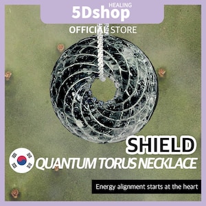 May include: A Quantum Torus necklace with a circular, spiraling design. The pendant is black and clear, suspended from a silver chain. The image includes the text "SHIELD" and "QUANTUM TORUS NECKLACE". The background is a green and purple color.