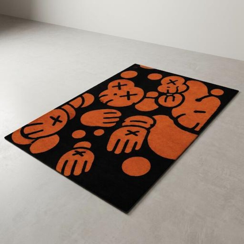Tappeto in lana trapuntato a mano, tappeto pop art ispirato a KAWS, tappeto nero e arancione per soggiorno. immagine 7