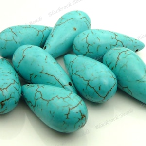 thumbnail interactive-video image 1 of Gorgeous Turquoise Blue Magnesite Slab Pendant Bead - Center Drilled 30-35mm 1 of 4