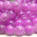 see more listings in the Glass Beads - Round Ball section