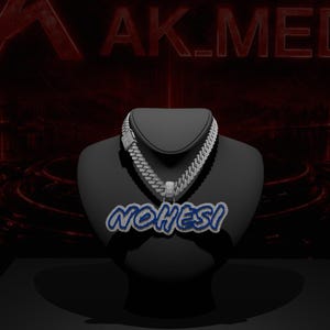 May include: A silver-toned cuban link chain necklace featuring a large, custom pendant with the text NOHESI in blue and white lettering. The pendant has a thick, layered border design and the chain is composed of interlocking, textured metal links.