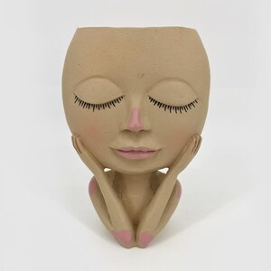 Meditating woman pot