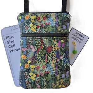 May include: A floral print crossbody bag with a black strap and zipper. The bag features a colorful pattern of flowers on a dark green background. A tag reads "Optional Zipper Pull Add $2.00". A card reads "Plus Size Cell Phone".