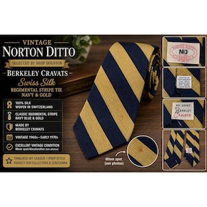 May include: A navy blue and gold striped necktie featuring a diagonal regimental pattern. The tie includes labels reading Norton Ditto, Berkeley Cravats, and Woven in Switzerland. A small, light-colored spot is visible on the fabric surface.