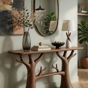 Puede incluir: Un letrero de madera rústica con el texto "Welcome to our home" en letras blancas. El letrero presenta un acabado envejecido y un diseño sencillo y acogedor, ideal para un porche o entrada.