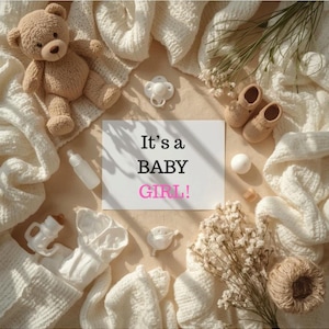 May include: A white rectangular card with the black text It's a BABY and pink text GIRL! surrounded by a tan teddy bear, white knitted blankets, two white pacifiers, a small bottle, a pair of tan baby booties, and dried white flowers.