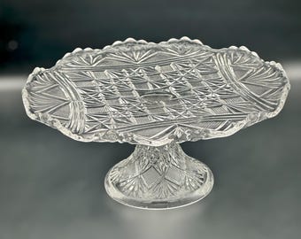 Soporte para pasteles antiguo de cristal prensado EAPG con pedestal y diseño de estrella y abanico.