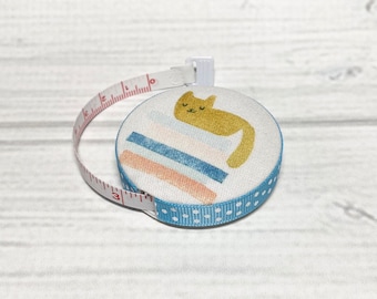 One More Chapter Fabric Covered Retractable Tape Measure