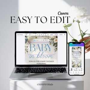 May include: A laptop and smartphone displaying a baby shower invitation design. The invitation features the text "BABY in bloom" in blue script, with floral accents. The laptop screen shows the design in an editing interface.