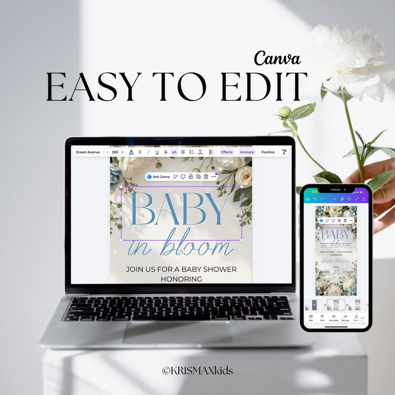 May include: A laptop and smartphone displaying a baby shower invitation design. The invitation features the text "BABY in bloom" in blue script, with floral accents. The laptop screen shows the design in an editing interface.