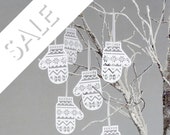 Six Papercut Mitten Decorations