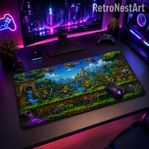 May include: A rectangular gaming mouse pad featuring a vibrant pixel art scene of four anthropomorphic turtles in a forest landscape with a castle, sewer pipes, and game interface elements. A black computer mouse rests on the surface of the pad.