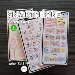 May include: Three paper craft smartphones with colorful app icons and the text "SMARTPHONE Paper Craft." One phone displays the time as 10:10. The image includes the text "Color | Cut | Glue" and a "Digital Download" icon.
