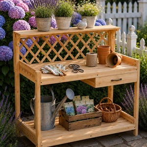 May include: A light-colored wooden potting bench with a lattice back, a drawer, and a lower shelf. The bench holds potted plants, gardening gloves, shears, twine, terracotta pots, a metal watering can, seed packets in a crate, and a wicker basket.