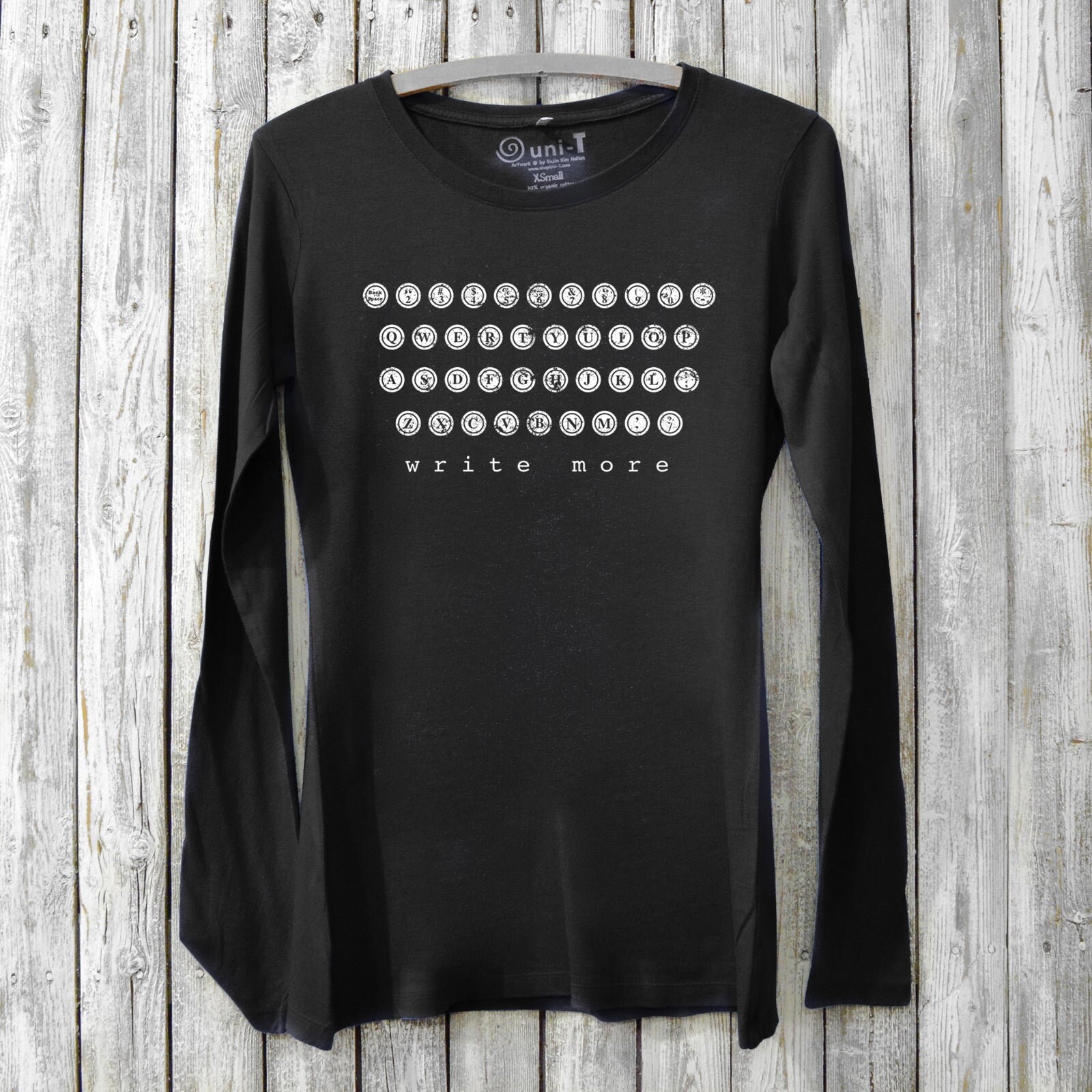 Black long sleeve shirt with white writing 2025