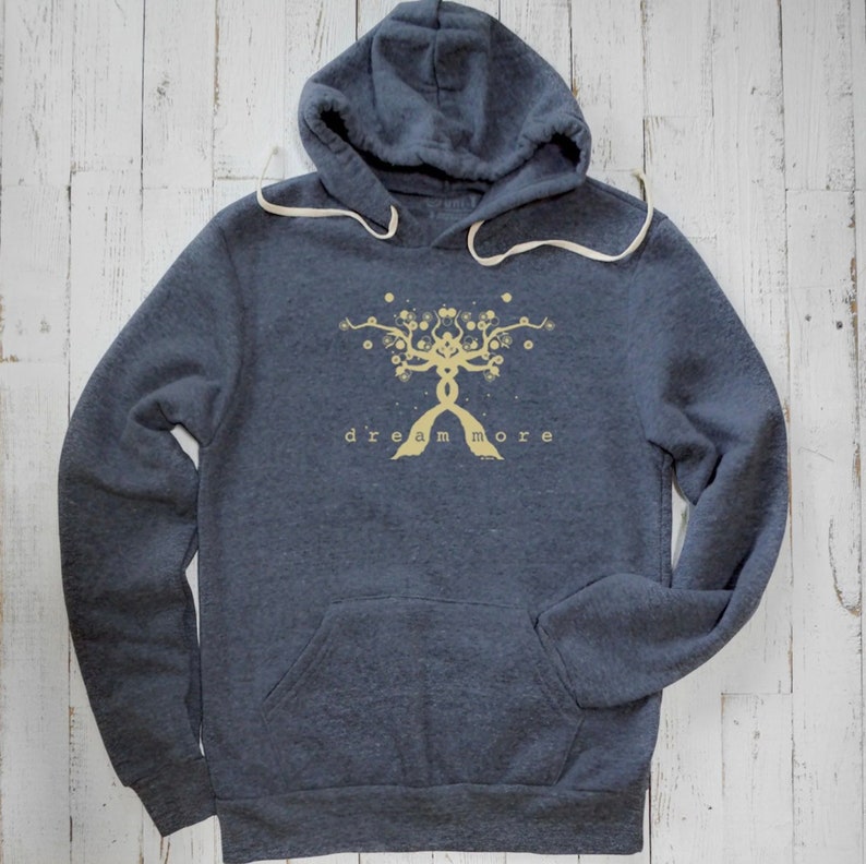 May include: A dark gray hooded sweatshirt with a yellow tree design and the text "dream more" on the front.