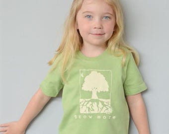 Camiseta infantil de algodão orgânico: estampa de árvore, roupa ecológica.