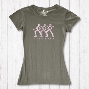 Olive green Women's Walking T-Shirt in Bamboo & Organic Cotton with pink 'Walk More' design. Eco-conscious activewear for outdoor lovers.