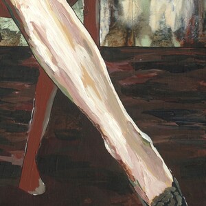 May include: A close-up of a woman's leg wearing a black and white patterned stocking. The leg is bent at the knee and the foot is pointing towards the bottom of the image. The background is a dark brown color.