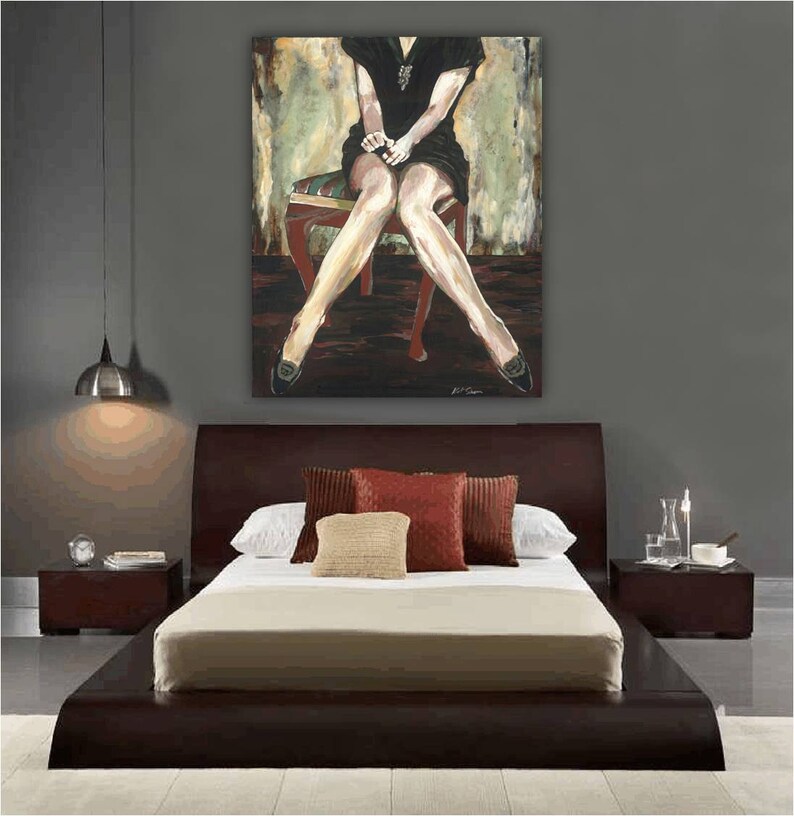 May include: A dark wood platform bed with a beige headboard and a white comforter. The bed has a painting of a woman sitting on a stool above the headboard. The painting is in shades of brown, green, and black.