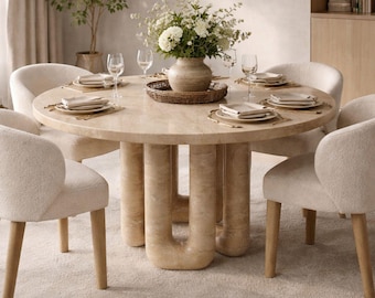 Mesa de comedor redonda de travertino: decoración moderna y escultural en piedra natural para el hogar.