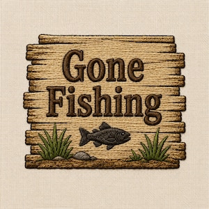 May include: Embroidered wooden sign with the words "Gone Fishing" in brown thread. A black fish and green grass are embroidered below the text, with a light beige background.