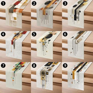 May include: Nine abstract table runners with geometric designs in various colors, including red, gold, black, and beige. Each runner features a unique pattern of lines, shapes, and forms, suitable for home decor.