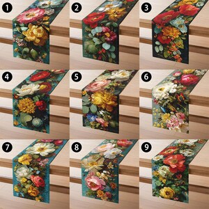 May include: A collection of nine floral table runners, each featuring a unique arrangement of colorful flowers. The runners showcase a variety of blooms in shades of red, yellow, pink, and white, set against a dark teal background. The designs vary in floral composition.