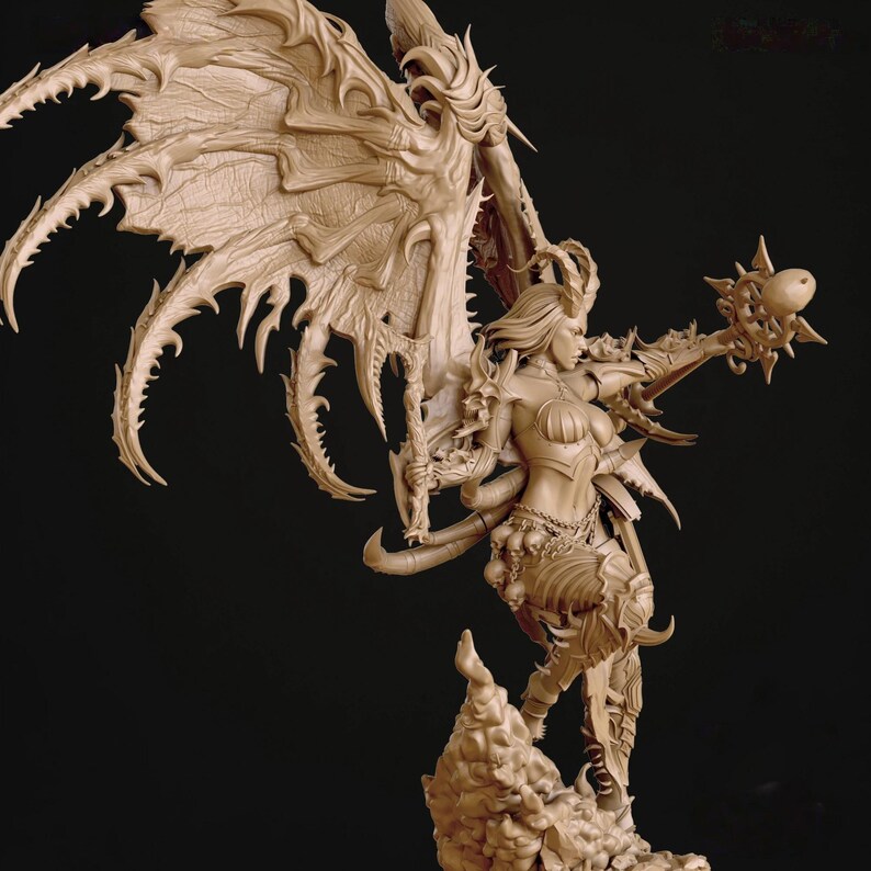 May include: A detailed beige figurine of a female warrior with large, ornate wings. She is holding a sword and a spiked orb, with intricate armor and a dynamic pose. The sculpture is set against a dark background.
