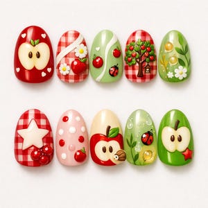 May include: A set of ten artificial nails with various apple-themed designs. The nails feature red, green, and pink colors, with detailed illustrations of apples, ladybugs, trees, and floral accents. Some nails have gingham patterns and white star accents.