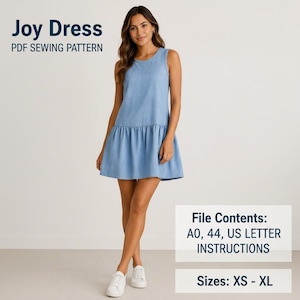 May include: A sleeveless, light blue denim Joy Dress with a ruffled hem. The image includes the text "Joy Dress PDF Sewing Pattern" and "File Contents: A0, 44, US LETTER INSTRUCTIONS Sizes: XS - XL". The dress is worn with white sneakers.