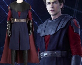 May include: A costume comprising a dark blue tunic over a red undershirt, with a black leather-style collar and belt. It includes a burgundy cape, black gloves, and trousers. The image also shows a person wearing a similar outfit.
