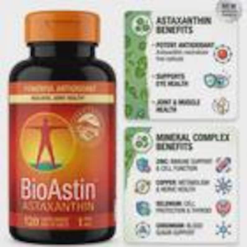 May include: A black bottle with an orange lid and a red and orange label. The label reads "BioAstin Astaxanthin" and "Powerful Antioxidant". The bottle contains 120 capsules. Additional text on the right side of the bottle describes the benefits of Astaxanthin and a mineral complex.