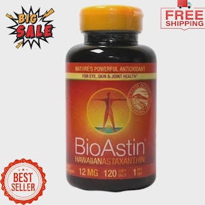 May include: A dark brown bottle of BioAstin Hawaiian Astaxanthin supplements. The label features text including "Nature's Powerful Antioxidant" and "12 MG 120 Soft Gels". The bottle has a yellow cap and is set against a light background. The image includes "Big Sale", "Best Seller", and "Free Shipping" graphics.